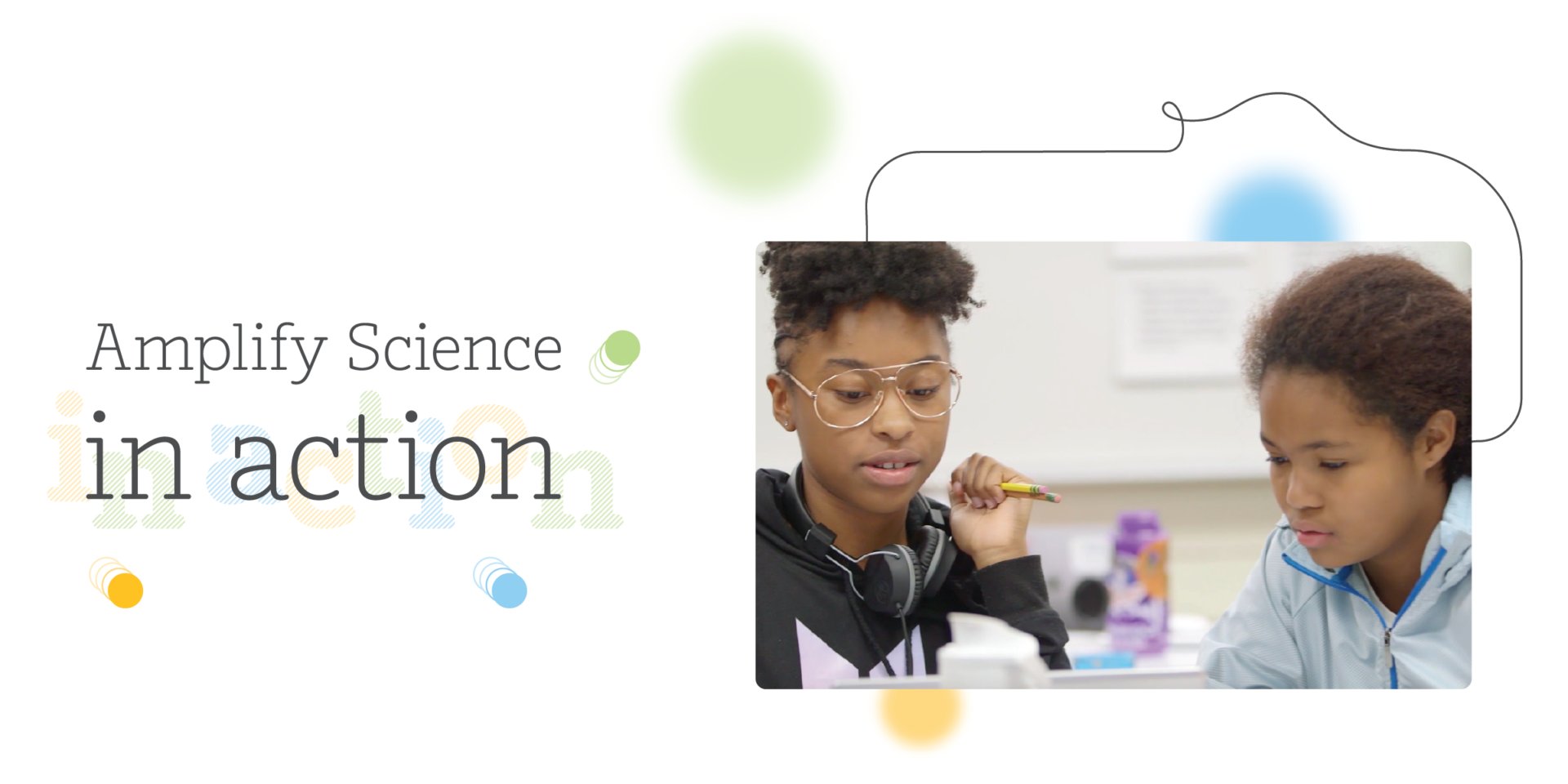 Two students, one wearing headphones, closely observe a science experiment in a classroom setting with the text