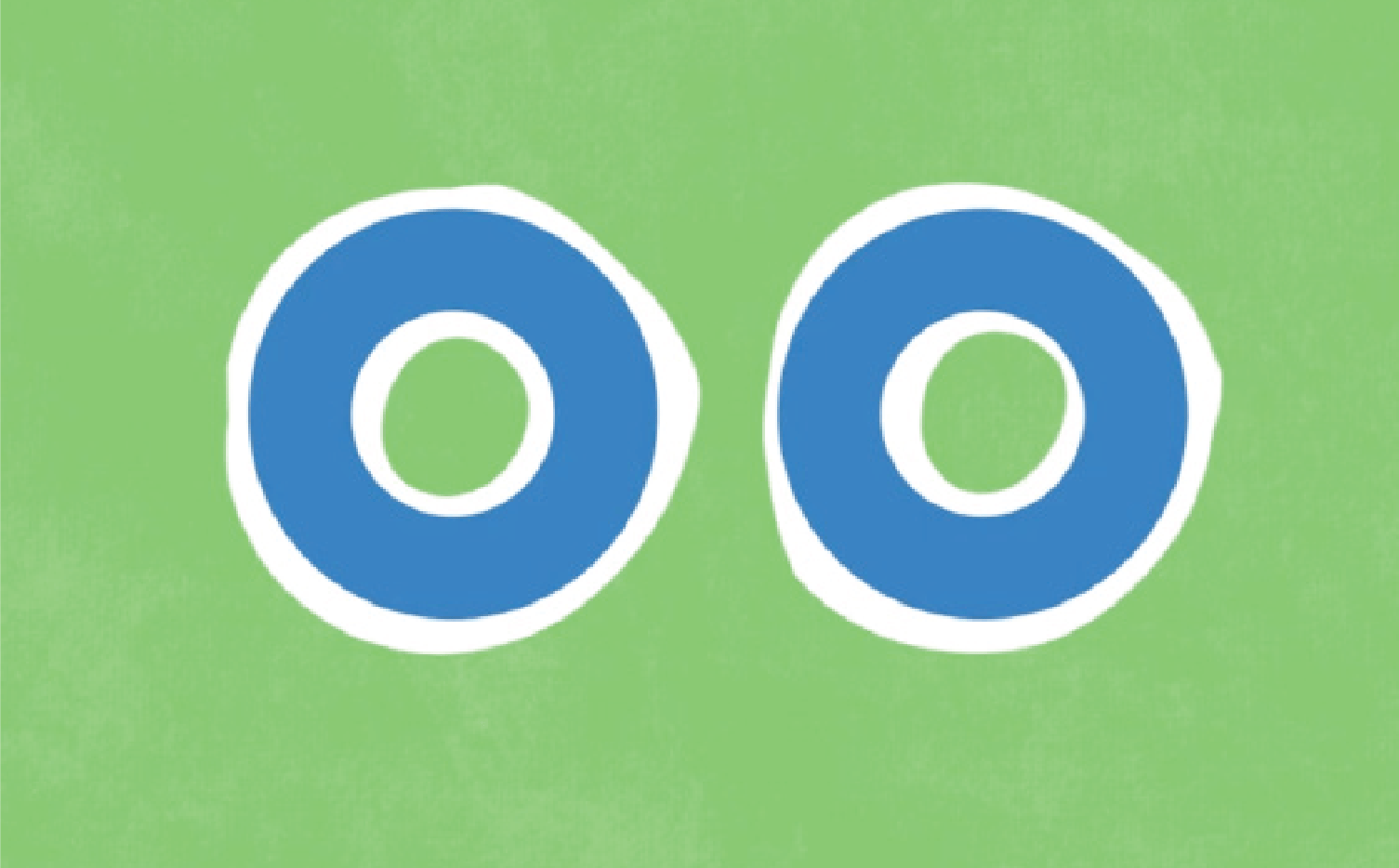 Two blue and white concentric circles resembling eyes on a green background, symbolizing the focus of an online language arts curriculum.