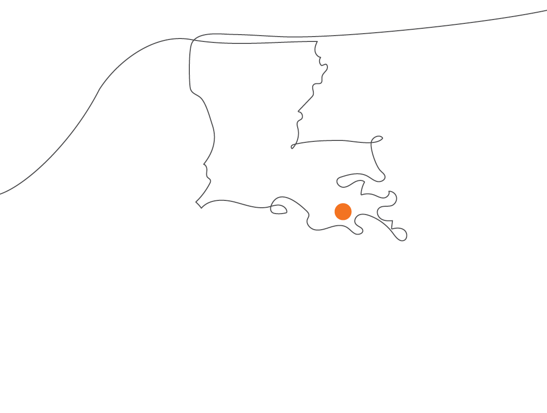 Line drawing of Louisiana with an orange dot marking the capital, Baton Rouge, illustrating a case study often discussed by science students.