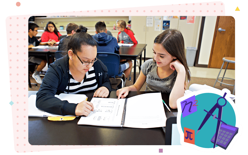Two students, one with glasses, collaborate on studying from a math textbook in a K-5 math classroom, with other students in the background.