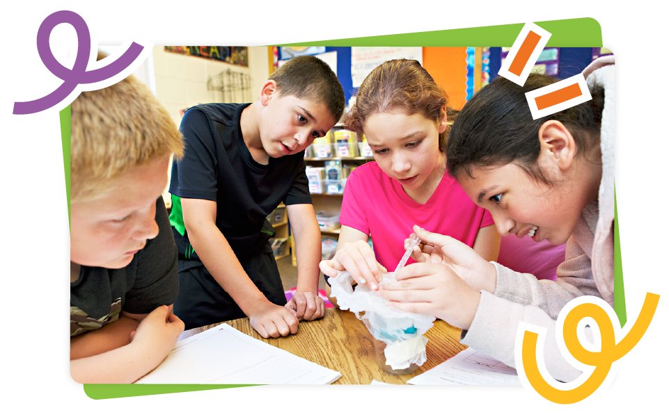 Four children engaged in an amplify science experiment in a classroom, examining materials closely with expressions of curiosity and focus.